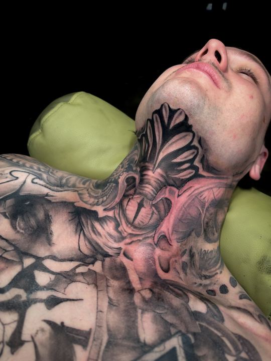 Black and grey realism neck tattoo