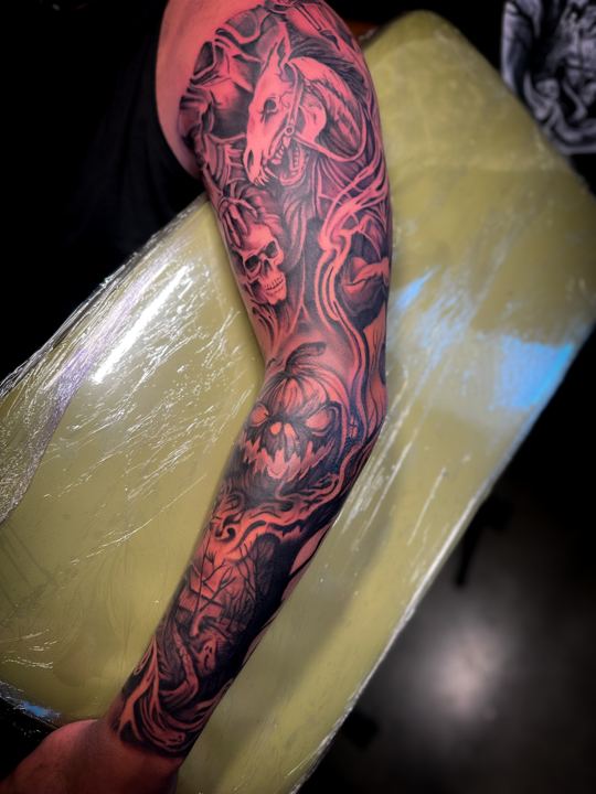 Black and grey realism headless horseman and pumpkin full sleeve